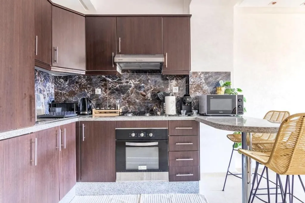 Image 4 of C-Appartement de luxe plein centre de gueliz avec piscine parking wifi netflix