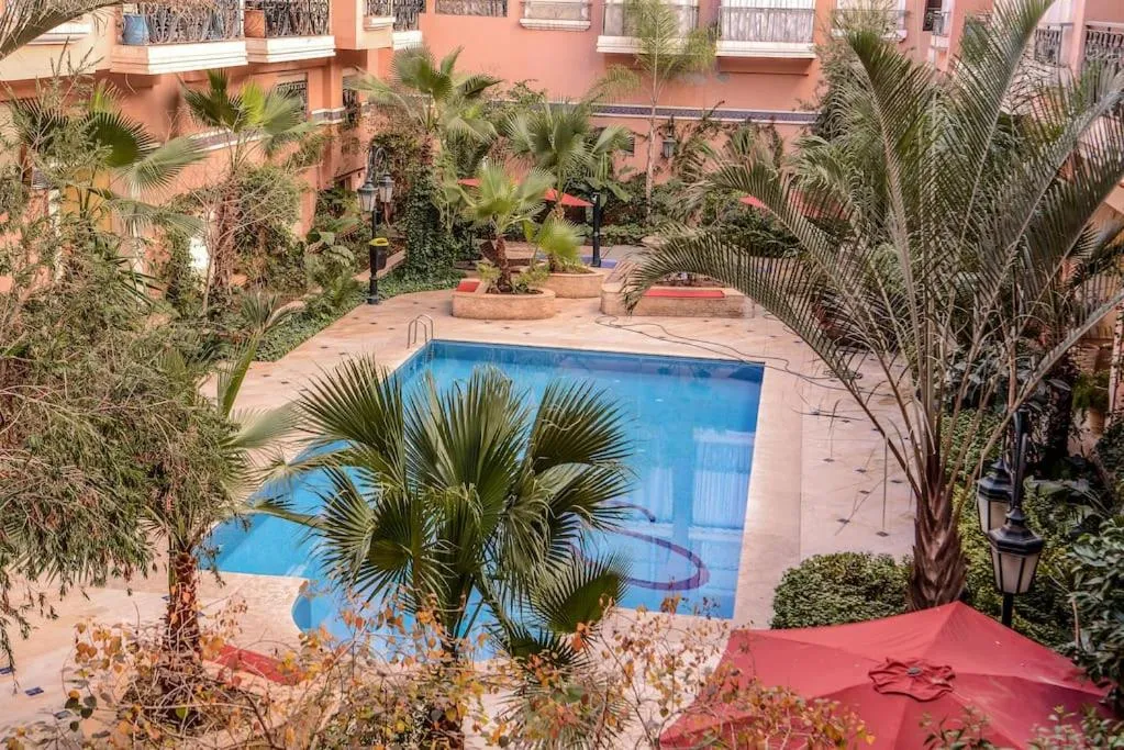 Image of Schöne tolle ausgestatte 122 m2 Ferienwohnung nahe majorelle garden und Gueliz mit Poolblick und großem Balkon und Terrasse