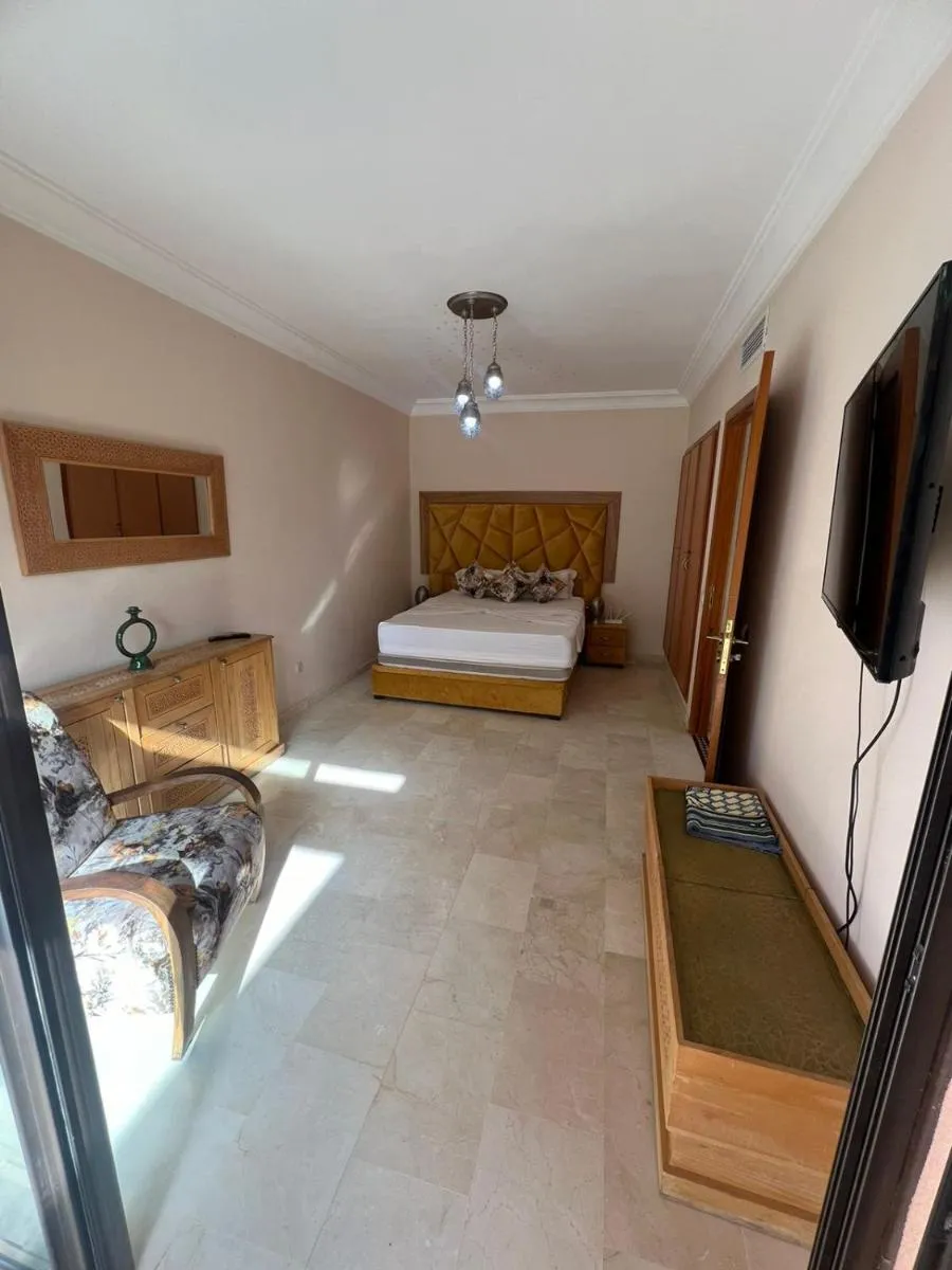 Image 3 of Appartement élégant avec vue sur piscine jardin verdoyant et wifi ultra rapide