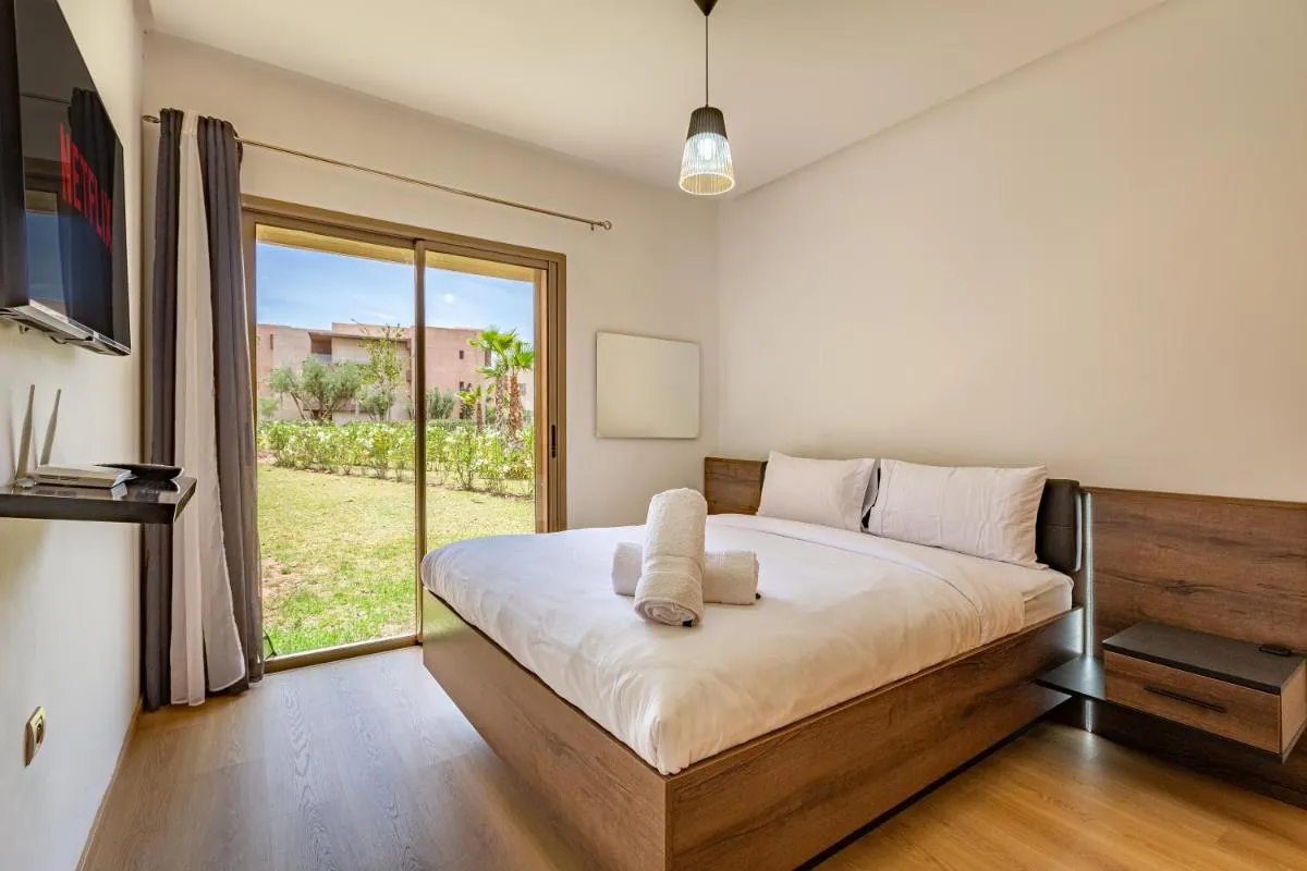 Image 1 of Luxury Garden-Level Apartment with Poolside Serenity