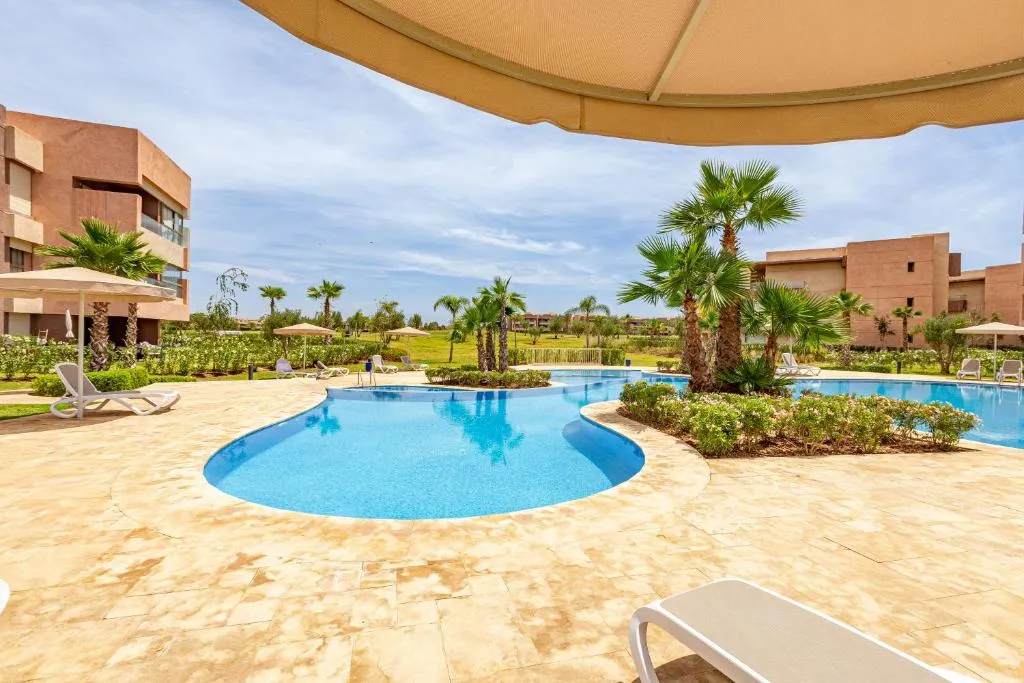 Image of Luxury Garden-Level Apartment with Poolside Serenity