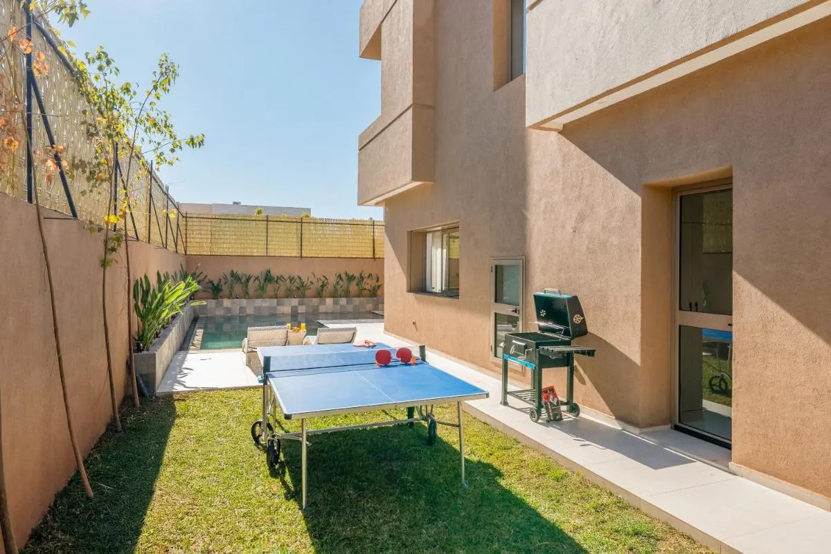 Image 4 of Villa Dar Yas, à 20min du Centre avec Piscine Chauffée, Cuisinière, Chauffeur, Air Hockey, Ping-Pong & Jeux de Société