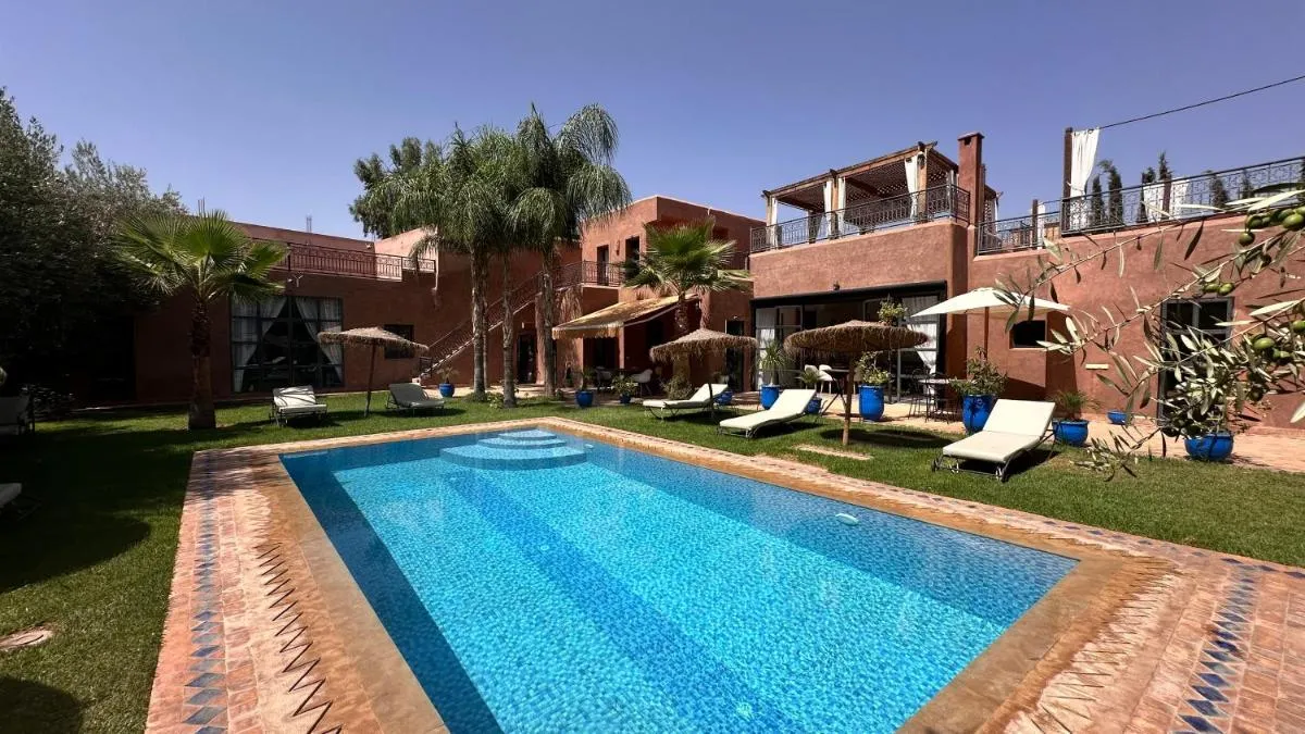 Image 3 of Villa Scil de luxe, Piscine chauffée, 3 Suites, Hamam, Jacuzzi extérieur, salle de sport, service Baby Sitter, option gouvernante, vue sur l’Atlas, Parkings Privé, Pas de Vis à Vis !